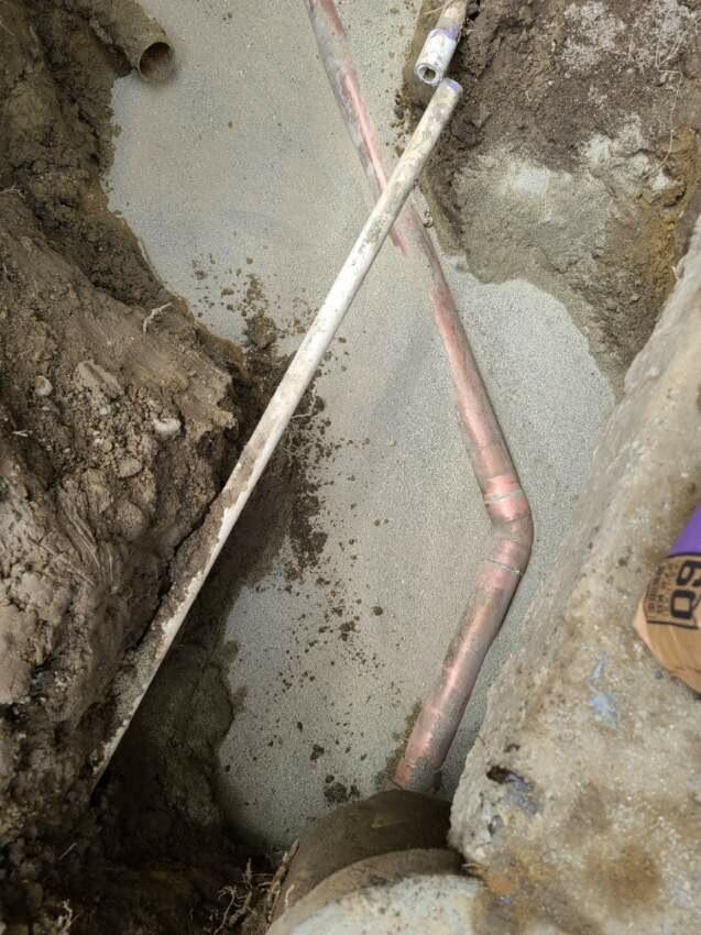 New copper water line run in an open trench